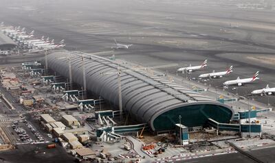 Emirates Airlines planes parked at the Dubai International airport. EPA