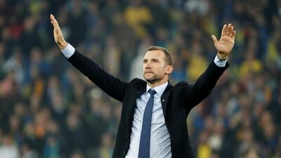 Ukraine coach Andriy Shevchenko celebrates at the end of the match. Reuters