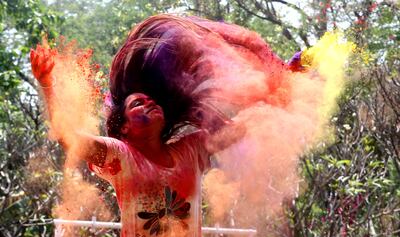 An Indian student takes part in Holi festival celebrations in Bhopal, India. EPA