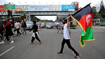 Afghan students protest against the newly formed Taliban government during a protest in Bangalore in September. EPA