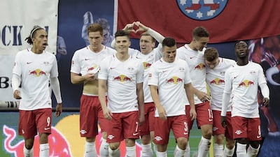 Leipzig players celebrate after scoring against Mainz in their Bundesliga match on Sunday. Jens Mayer / AP Photo / November 6, 2016