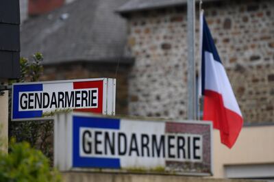 A French flag is seen lowered to half mast at the gendarmerie in Hédé-Bazouges, suburb of Rennes, western France, as a tribute to French Lieutenant Colonel Arnaud Beltrame. Damien Meyer/ AFP Photo
