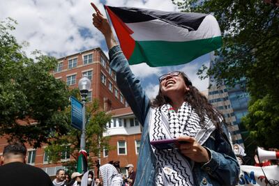 Activists and students on the outskirts of an encampment protest at the University Yard at George Washington University in Washington last week. AFP