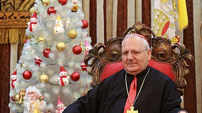 In this Monday, Dec. 18, 2017 photo, Louis Raphael Sako, Chaldean Patriarch speaks during an interview with The Associated Press in Baghdad, Iraq. In a surprise announcement to pilgrims and tourists, Pope Francis has announced that he will make 14 new cardinals next June 29, among which is Chaldean Pathriach Sako. Khalid Mohammed / AP
