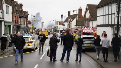 Bystanders on the North Street in Midhurst. PA