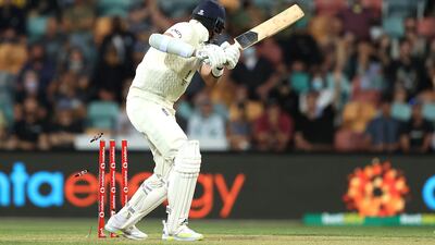 England batsman Stuart Broad is bowled by Mitchell Starc of Australia for a duck. Getty