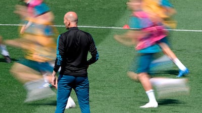 Real Madrid manager Zinedine Zidane oversees training ahead of the Uefa Champions League final. Gabriel Bouys / AFP