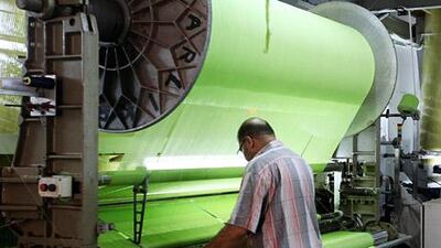 A worker at Arab Cotton Ginning, which holds a general assembly today