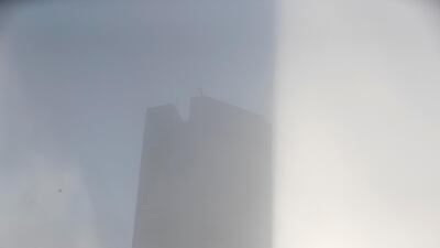 Buildings obscured by fog in Dubai. Antonie Robertson / The National