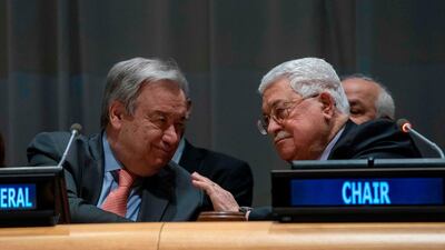 UN Secretary General Antonio Guterres speaks with Palestinian president Mahmud Abbas during a meeting of the UN Group of 77 and China in New York. AFP