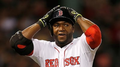 David Ortiz of the Boston Red Sox reacts after popping out with a man on base in the fifth inning during a game with the Toronto Blue Jays at Fenway Park on May 21, 2014 in Boston, Massachusetts. Jim Rogash/Getty Images
