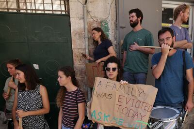 Activists outside the home of the Sub Laban family in Jerusalem's Old City after their eviction. AFP