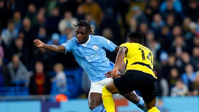 Manchester City winger Jeremy Doku and Young Boys' Miguel Chaiwa battle for the ball. PA