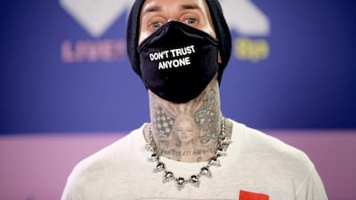 Blink-182 drummer Travis Barker has recently overcome his fear of flying following a fatal 2008 plane crash. Getty Images