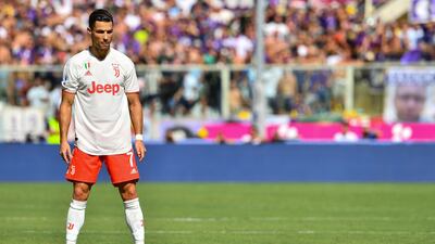 Juventus' Portuguese forward Cristiano Ronaldo prepares to shoot a free kick during the Italian Serie A match against Fiorentina at the Artemio-Franchi Stadium in Florence. The match ended 0-0. AFP