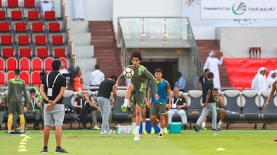 Al Wasl players warm up before the final at Zayed Sports City Stadium on Thursday. Victor Besa / The National