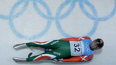 Shiva Keshavan speeds down the luge track during training. He wants cricket-crazy India to notice him at the 2010 Winter Olympics.