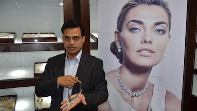 CEO Ajay Pandey with an exclusive Gitanjali necklace.