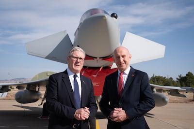 Prime Minister Keir Starmer (left) and Defence Secretary John Healey stand in front of a UK Typhoon fighter jet at Tusas airbase in Ankara, during a visit to Turkey last year. PA