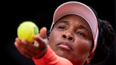American Venus Williams serves to Jennifer Brady during their match at the Madrid Open on Friday, April 30. Brady won the game 6-2, 6-4. AP