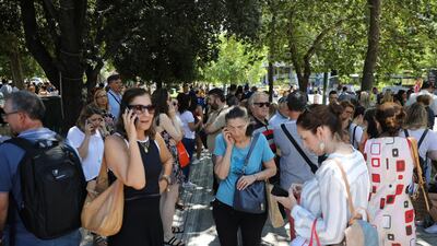 People are seen on the Syntagma Square following the evacuation of nearby buildings after an earthquake in Athens, Greece, July 19, 2019. REUTERS/Alkis Konstantinidis