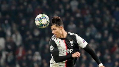 Ronaldo jumps for the ball during the Champions League match between Juventus and Atletico Madrid at the Allianz stadium in Turin. AP