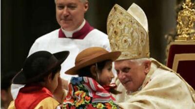 Pope Benedict XVI blesses children as he celebrates the Christmas Midnight Mass in St Peter's Basilica at the Vatican, early on Dec 25 2008.