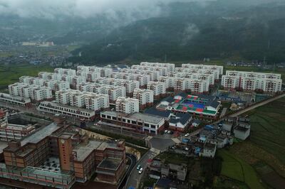An aerial view captured on September 11, 2020 shows apartments built by the Chinese government in Yuexi county, Sichuan province, China. The ruling Communist Party says initiatives like housing construction have helped to lift millions of people out of poverty. AP