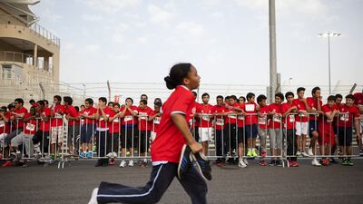 About 3,000 schoolchildren ran in the Abu Dhabi Educational Council Marathon at Yas Marina Circuit and took part in sports such as jiu jitsu and rock climbing. The event was part of Adec’s Champions of Tomorrow initiative. Christopher Pike / The National