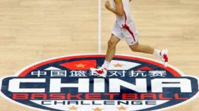 Yao Ming runs during a training session in China's southern Guangdong province. The 2.36m centre has made basketball a big draw in China - and the NBA is now looking to raise the game's profile in India.