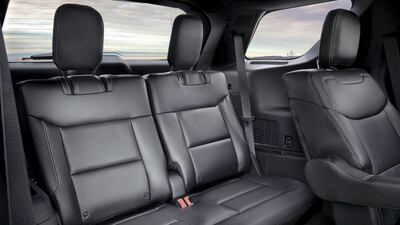 Climbing into the back is easier with a power-operated function that slides the second-row seat out of the way with the touch of a button