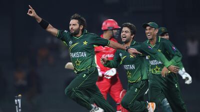 Shahid Afridi, left, has received support from India stars like Yuvraj Singh and Harbhajan Singh for his charity work. Getty Images