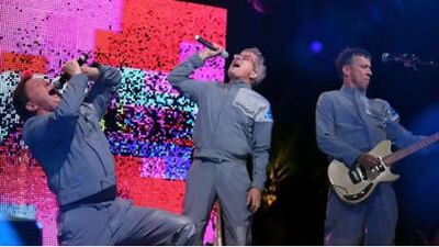 We are Devo: left to right, Gerald Casale, Mark Mothersbaugh and Bob Mothersbaugh "are fighting the good fight to spread the Devolutionary message across the globe".