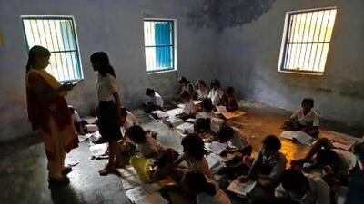 Schoolchildren study inside their classroom at their government-run primary school, at Brahimpur village in the Chapra district of the eastern Indian state of Bihar.