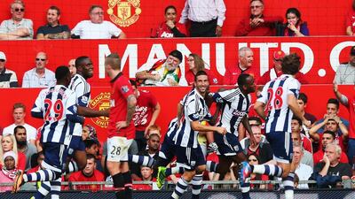 Saido Berahino, second right, celebrates what was the winning goal against Manchester United with his West Brom teammates. Alex Livesey / Getty images