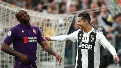 Cristiano Ronaldo celebrates after his shot caused the own goal to give Juventus a 2-1 lead against Fiorentina. AFP