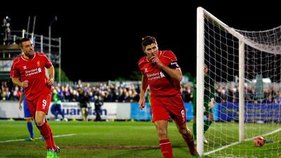 Steven Gerrard of Liverpool celebrates after scoring the opening goal with a header in his side's FA Cup third round victory over AFC Wimbledon. Julian Finney / Getty Images