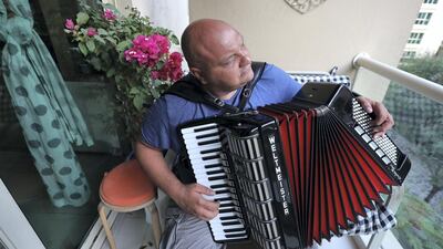 Boki found himself at home and his business on hold, so is helping himself and neighbours in The Greens pass the time. All photos by Chris Whiteoak / The National