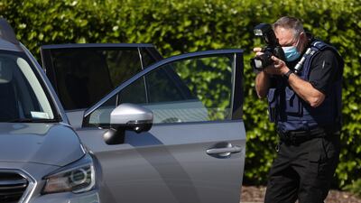 Police forensic staff continue to gather evidence. Getty Images