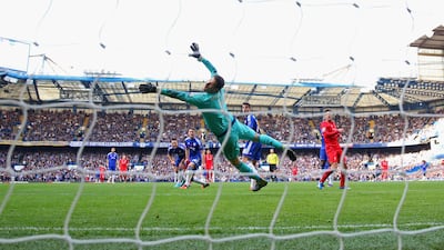 Asmir Begovic of Chelsea fails to stop the second goal by Philippe Coutinho. Clive Rose / Getty Images