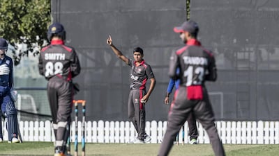 Aryan Lakra bowling for UAE U19s against Scotland at the ICC Academy in Dubai Sports City in January 2020. Antonie Robertson / The National