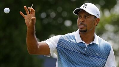 Tiger Woods said he suffered a recurrence of the injury which forced his withdrawal from the Bridgestone Invitational on Sunday. Brian Snyder / Reuters