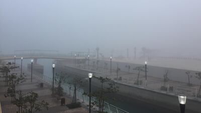 A foggy morning on Reem Island, Abu Dhabi. Jason Von Berg / The National