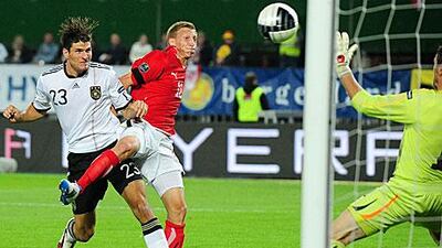 Mario Gomez scores the winning goal for Germany in the dying moments of the game in Ernst-Happel Stadium.