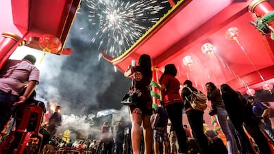 Fireworks light up the sky at the Pak Pie Hut Cou temple in Medan, North Sumatra, Indonesia. Dedi Sinuhaji / AFP Photo