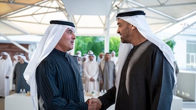 Sheikh Mohamed greets Abdul Aziz Al Ghurair, chairman of Mashreq. Abdulla Al Neyadi / UAE Presidential Court