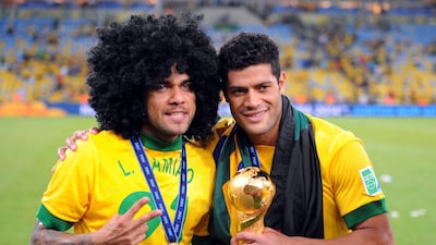 Daniel Alves, left, and Hulk were instrumental in Brazil's winning run through the Fifa competition. Michael Regan / Getty Images