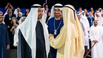President Sheikh Mohamed speaks with Sheikh Mohammed bin Rashid, Vice President and Ruler of Dubai, before the opening ceremony of the World Laureates Summit. Mohammed Al Gergawi, Minister of Cabinet Affairs, also attended. Hamad Al Kaabi / UAE Presidential Court