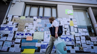 Posters supporting Diego Armando Maradona in front of the Olivos clinic. EPA