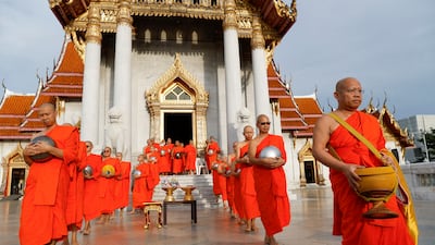Monks mark the end of Buddhist Lent at Wat Benchamabophit Dusitvanaram, also known as the Marble Temple, in Bangkok. EPA